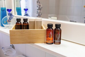 Hair dryer, towels, soap, toilet paper