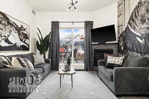 Smart TV, fireplace, books