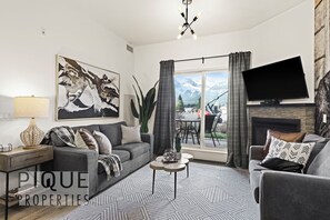 Smart TV, fireplace, books