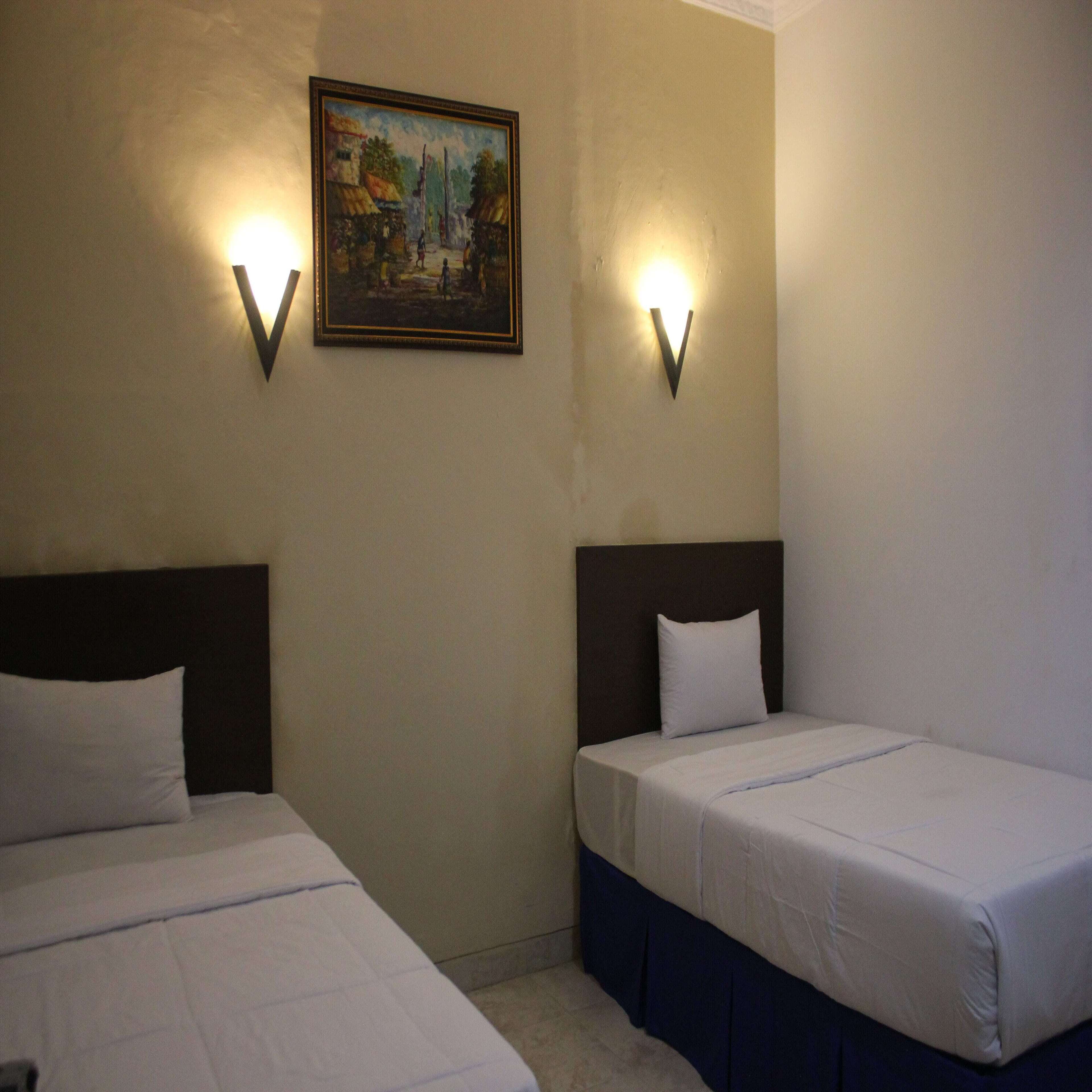 Habitación Deluxe, 2 habitaciones | Escritorio, insonorización, wifi gratis y ropa de cama 