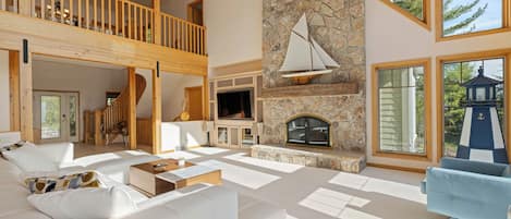Smart TV, fireplace, foosball, books