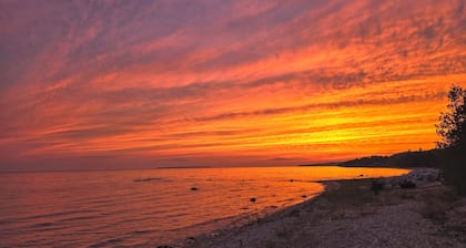 Octagon Beach House
Enjoy a tranquil getaway w/private beach on Lake Michigan