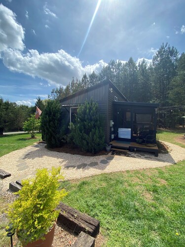 Adventurous tiny house! Located on 1 acre surrounded by evergreen forest