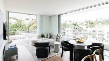 Superior Apartment, 2 Bedrooms, Partial Ocean View | Living area | Flat-screen TV