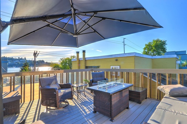 Large deck with firepit and stunning views of Lake Union.