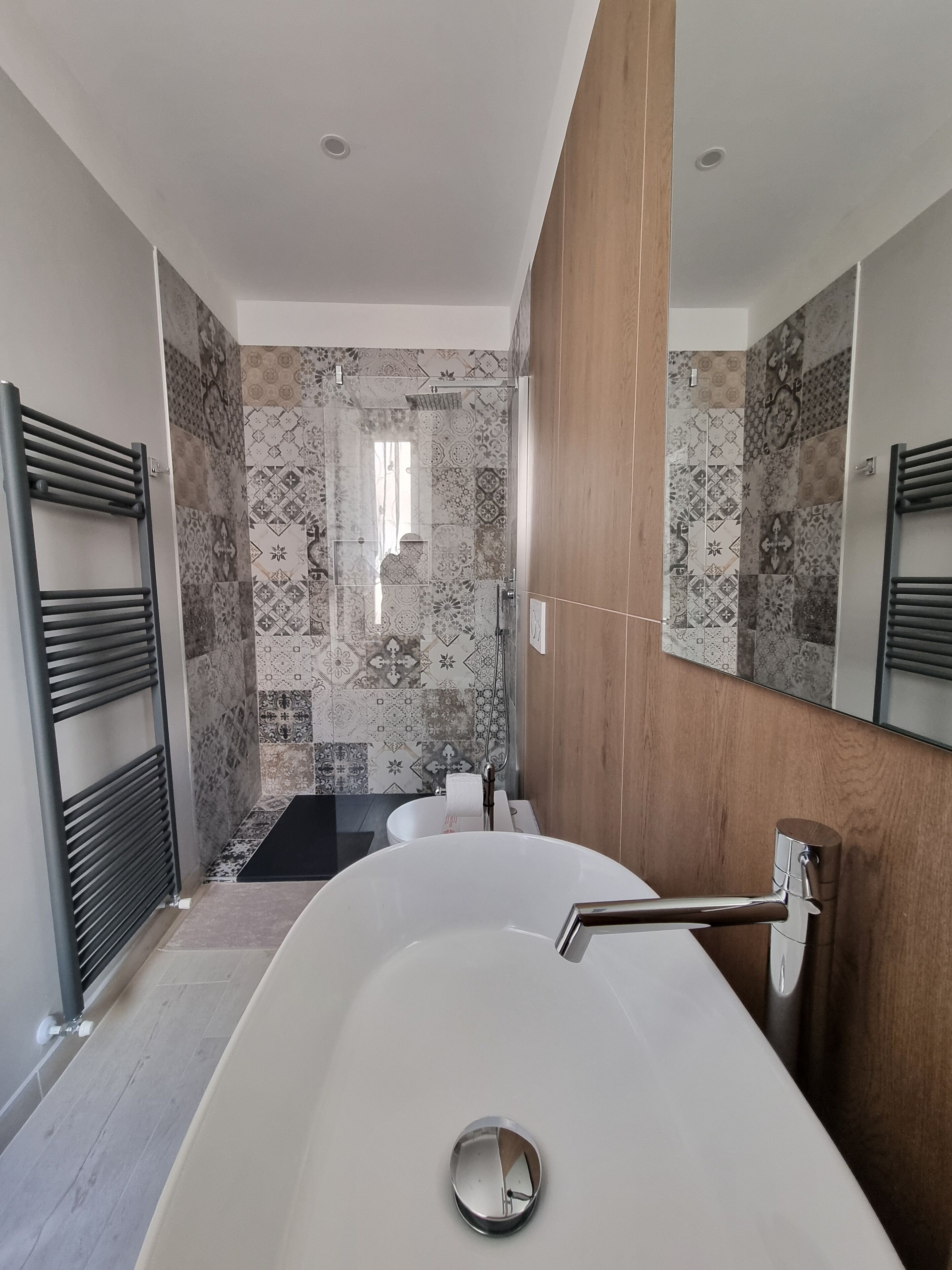 Shower, free toiletries, hair dryer, slippers