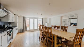 Comfort Apartment | Private kitchen | Full-size fridge, microwave, oven, stovetop