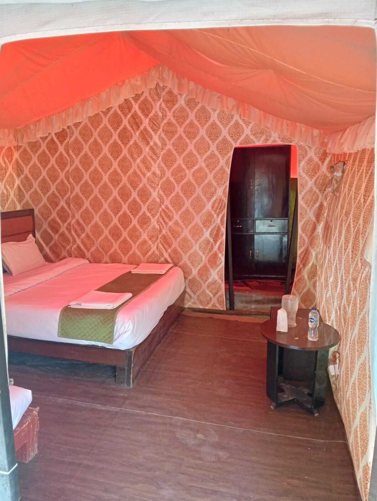 Basic Tent | Premium bedding, desk, free wired Internet, bed sheets