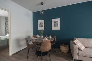 Apartamento standard | Área de estar | TV 32 polegadas com canais a cabo