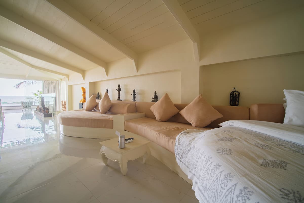 Suíte superluxo, vista para a praia | 1 quarto, cofres nos quartos, Wi-Fi de cortesia, roupa de cama