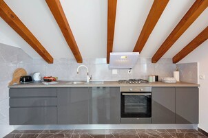 Standard Apartment | Private kitchen | Full-size fridge, oven, dishwasher, electric kettle