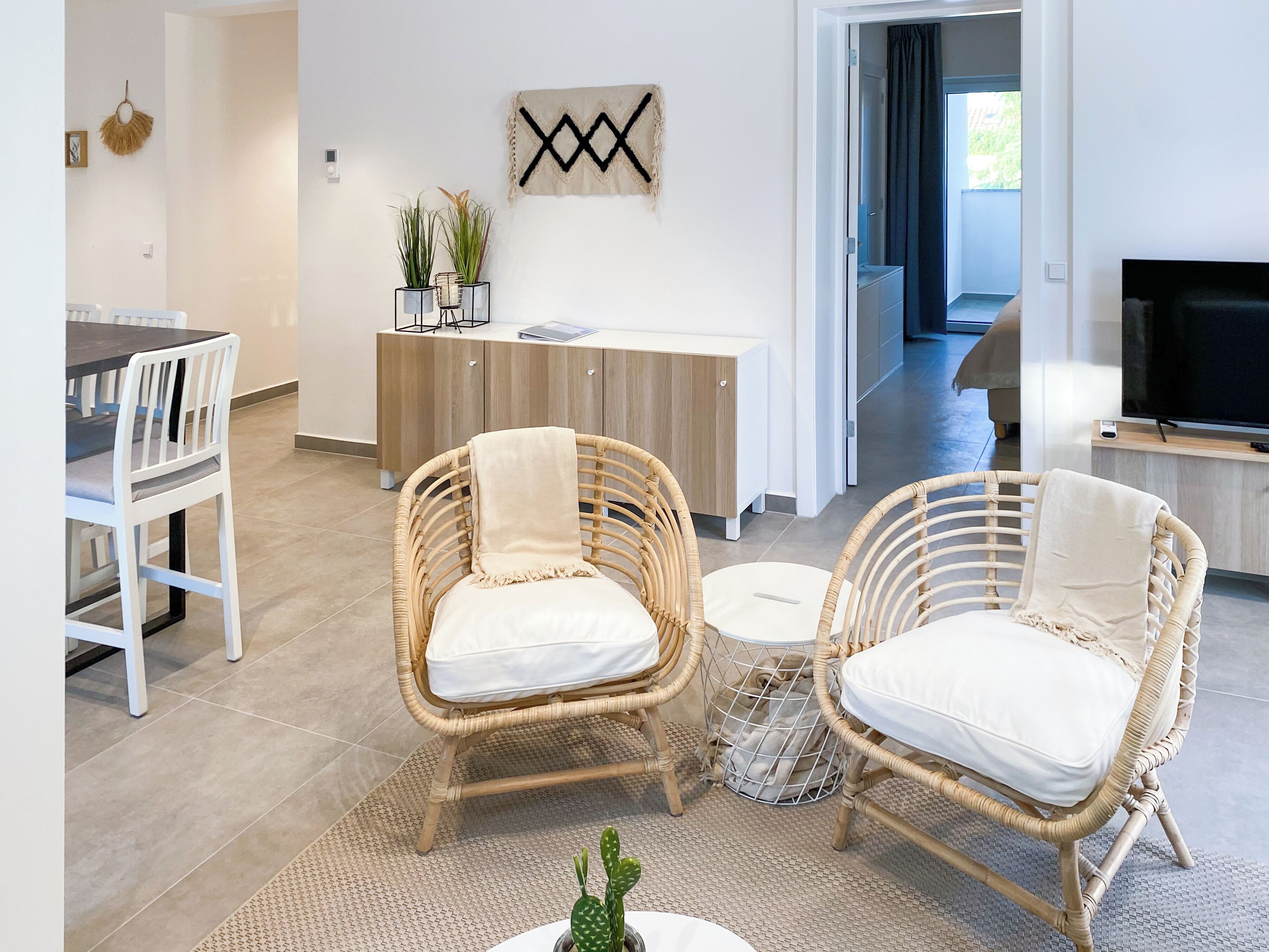 Apartamento superluxo, vista para o mar | Área de estar | TV