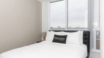 1 bedroom, desk, iron/ironing board, travel crib