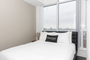 1 bedroom, desk, iron/ironing board, travel crib