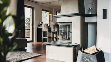 Deluxe Apartment, Balcony, Garden View | Living area | TV