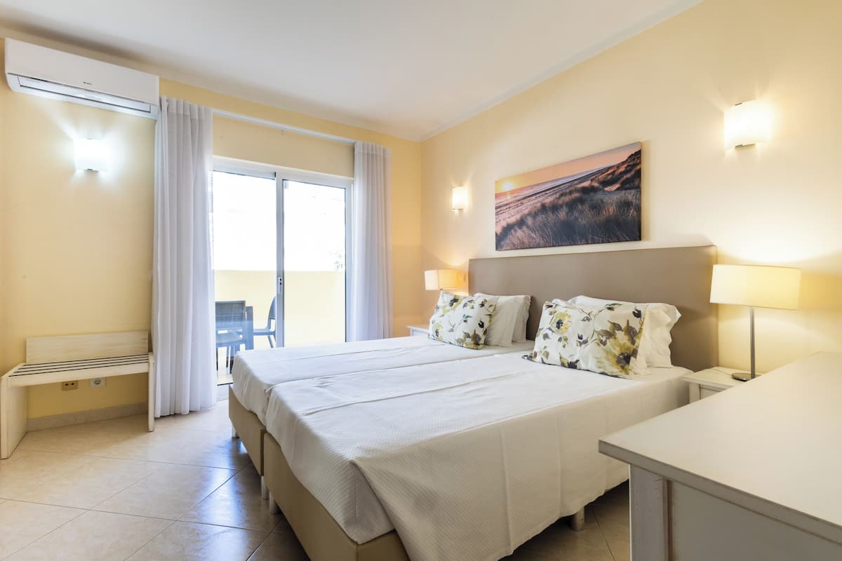 Blackout drapes, soundproofing, iron/ironing board, WiFi (free)
