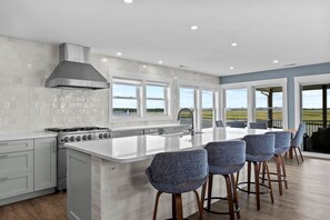 Fridge, microwave, oven, stovetop - By George Waterfront - 4BR Amazing Canalfront Home - Dock & Boat Ramp! (Surf City)