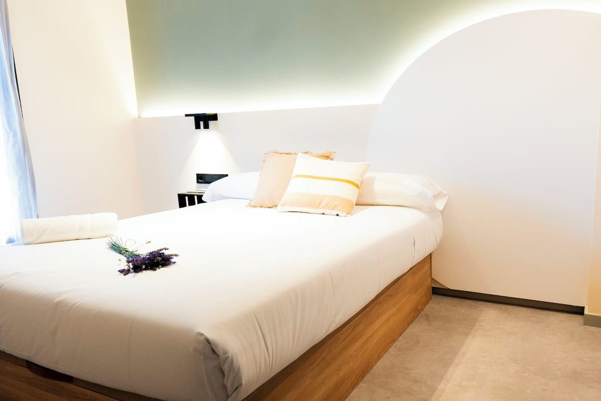 Premium bedding, down comforters, desk, laptop workspace