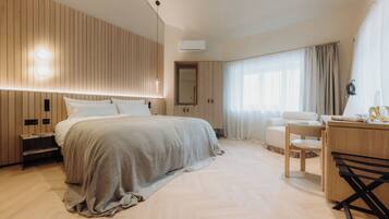 Studio Deluxe - utsikt mot innergården | Sängtillbehör av högsta kvalitet, duntäcken och minibar