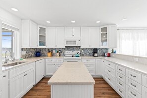 Fridge, dishwasher, coffee/tea maker - Blue Water Retreat - 5706 W Beach Drive- Coastal Vacation Resorts (Oak Island)