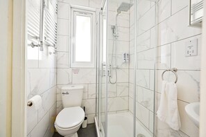 Hair dryer, towels, soap, shampoo