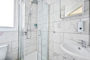 Hair dryer, towels, soap, shampoo