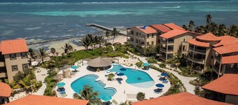 Beachfront Bliss: Stunning Oceanfront 2BR Condo in Ambergris Caye!
