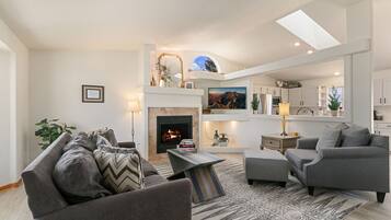 House, Multiple Beds, Patio, Garden View (2719 Daffodil Place - Whole House) | Living area | 42-inch flat-screen TV with digital channels, TV, fireplace