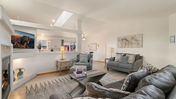 House, Multiple Beds, Patio, Garden View (2719 Daffodil Place - Whole House) | Living area | 42-inch flat-screen TV with digital channels, TV, fireplace