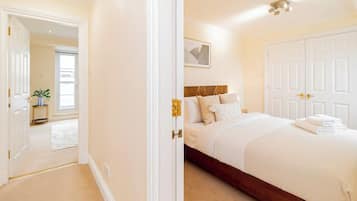 2 dormitorios, tabla de planchar con plancha, cuna de viaje y wifi