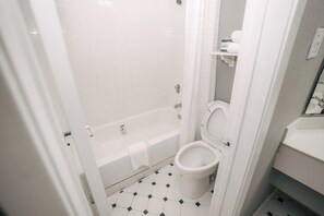 Comfort Room, 1 King Bed | Bathroom | Bathtub, hair dryer, towels, soap - Guest Inn & Suites (Peachtree Corners)