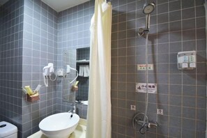 A bathroom with a sink, mirror, shower, and towel rack. - City 118 Chain Hotel Zhengzhou Economic Development Zone (Zhengzhou)