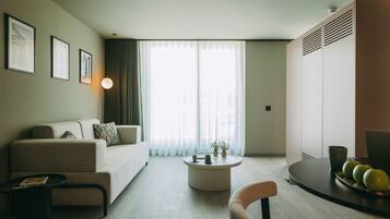 Superior Studio, City View | Living area | 43-inch LCD TV with cable channels