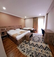 Classic Triple Room, Balcony, Mountain View | In-room safe, soundproofing, iron/ironing board, free WiFi