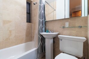 Hair dryer, towels, soap, shampoo