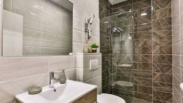 Shower, free toiletries, hair dryer, towels
