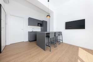 Family Duplex | Living area | Flat-screen TV