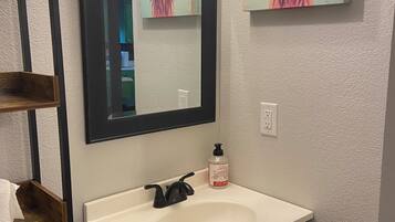 Hair dryer, towels, soap, shampoo