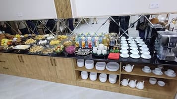 Daily buffet breakfast (USD 4 per person)