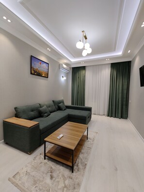 Desk, iron/ironing board, free WiFi, bed sheets - Baurum Family Apartments (Tashkent)