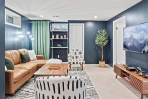 Smart TV, fireplace, table tennis, books
