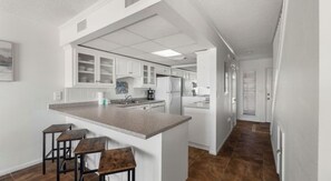 Microwave, oven, stovetop, dishwasher - Escape to Paradise: Stunning Oceanfront Beach House on Emerald Green Gulf Waters (Panama City Beach)