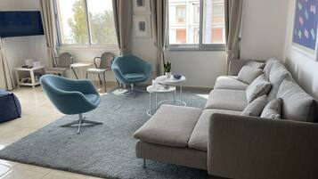 Deluxe Apartment, Balcony, Sea View | Living area