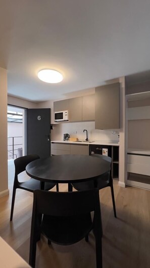 Studio Suite | Premium bedding, down comforters, memory foam beds, in-room safe