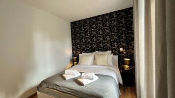 1 habitación, tabla de planchar con plancha, wifi y ropa de cama