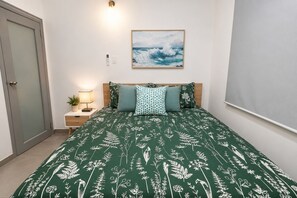 3 habitaciones, tabla de planchar con plancha, wifi y ropa de cama 