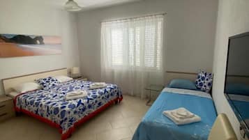2 quartos, acesso à internet, roupa de cama