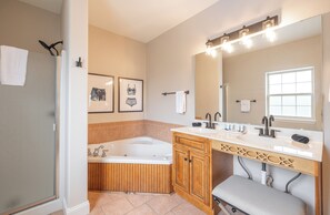 Jetted bath, hair dryer, towels, soap
