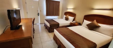 Economy Room, 2 Queen Beds, Non Smoking | In-room safe, desk, laptop workspace, soundproofing