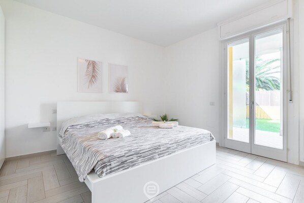 1 bedroom, desk, iron/ironing board, travel crib